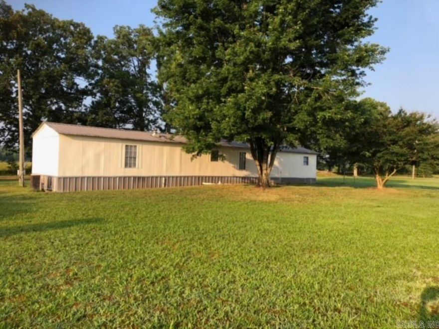 Come check out this newly updated 3 bedroom 2 bathroom mobile home in a  country setting on spacious lot!
