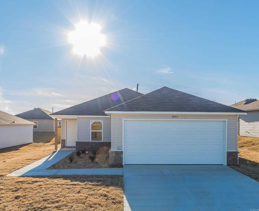 The Bridgeport plan is a 4-bedroom with a clever use of space. Bedrooms 2, 3 & 4 are just steps from their bathroom and the Laundry Room. The Living Room and Kitchen are open and generously sized.   Thoughtful upgrades in this home: soaker tub/shower combo in Master Bath, plumbing faucet upgrade 2, gas furnace, door bell, laminate flush bar top in Kitchen, raised ceilings in Living Areas per municipal requirements, Cheyenne style interior doors, baseboards level 2, crown molding in Living Areas and Master Bedroom, 25 in wide attic stairs, LED disk lights in Kitchen, level 1 ceiling fan in Living Room, full sod, microwave hood in Kitchen, smooth top range.   THIS HOME IS SCHEDULED TO BE COMPLETE IN EARLY FEBRUARY.