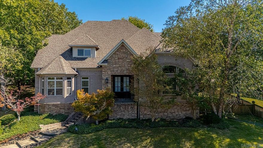 Beautiful move in ready home in The Villages of Wellington in LR! This custom home has all the extras. From all the stone work on the exterior to the extensive crown molding on the inside this home is a must see! As you step through the double doors you are welcomed by the two story foyer. Formal living room to the right with a gas fireplace that leads to the formal dining room and into the hearth room with another gas fireplace. Gourmet kitchen with dual islands, gas stove and plenty of cabinets for storage. Private primary wing on the main floor with a huge walk in closet, dual vanity areas, soaking tub and walk in shower. Upstairs you will find 2 more bedrooms with a jack & jill bathroom connecting them. Another bedroom with it's own en-suite. Plus a bonus room that was used as a movie room. Must see to appreciate! Sq ft measuring encourage.