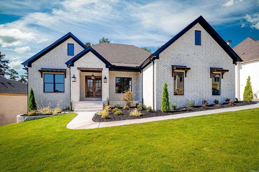 Gorgeous new construction in Chenal Valley. Great floor plan with Primary Bedroom plus an additional Bedroom with an ensuite Bath on the Main Level.  Wonderful Kitchen open to the Great Room. Breakfast Room plus Dining Room. Study with built ins. Two additional Bedrooms with two Bathrooms plus a Bonus room with a Kitchen downstairs. Also downstairs is a Flex Room perfect for a Work Out Room or Hobby Room. Two covered porches. Greenbelt. Three car side load garage. Lots of extras including epoxy coated garage floor, 2 gas log fireplaces, central vac and much more!  Convenient location close to schools, shopping and dining. Three neighborhood pools and parks to choose from throughout Chenal Valley.