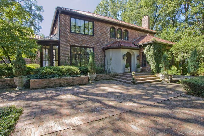 Stunning Edgehill home with exceptional living spaces. Numerous renovations and the ultimate in quality craftsmanship. Unparalleled design and construction combine with old world charm to create spectacular setting for family living and dining. Vaulted brick ceilings and floor to ceiling arched windows overlooking fabulous pool and grounds. Full Guest home with approx. 530 sf not included.