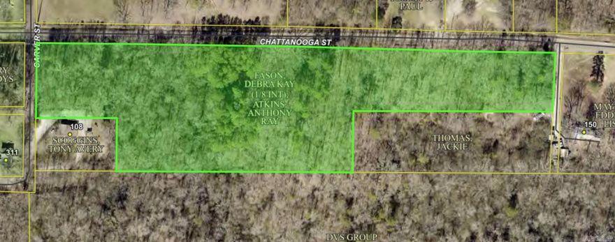 Wooded 7+/- acre parcel. Electric and water at the road.