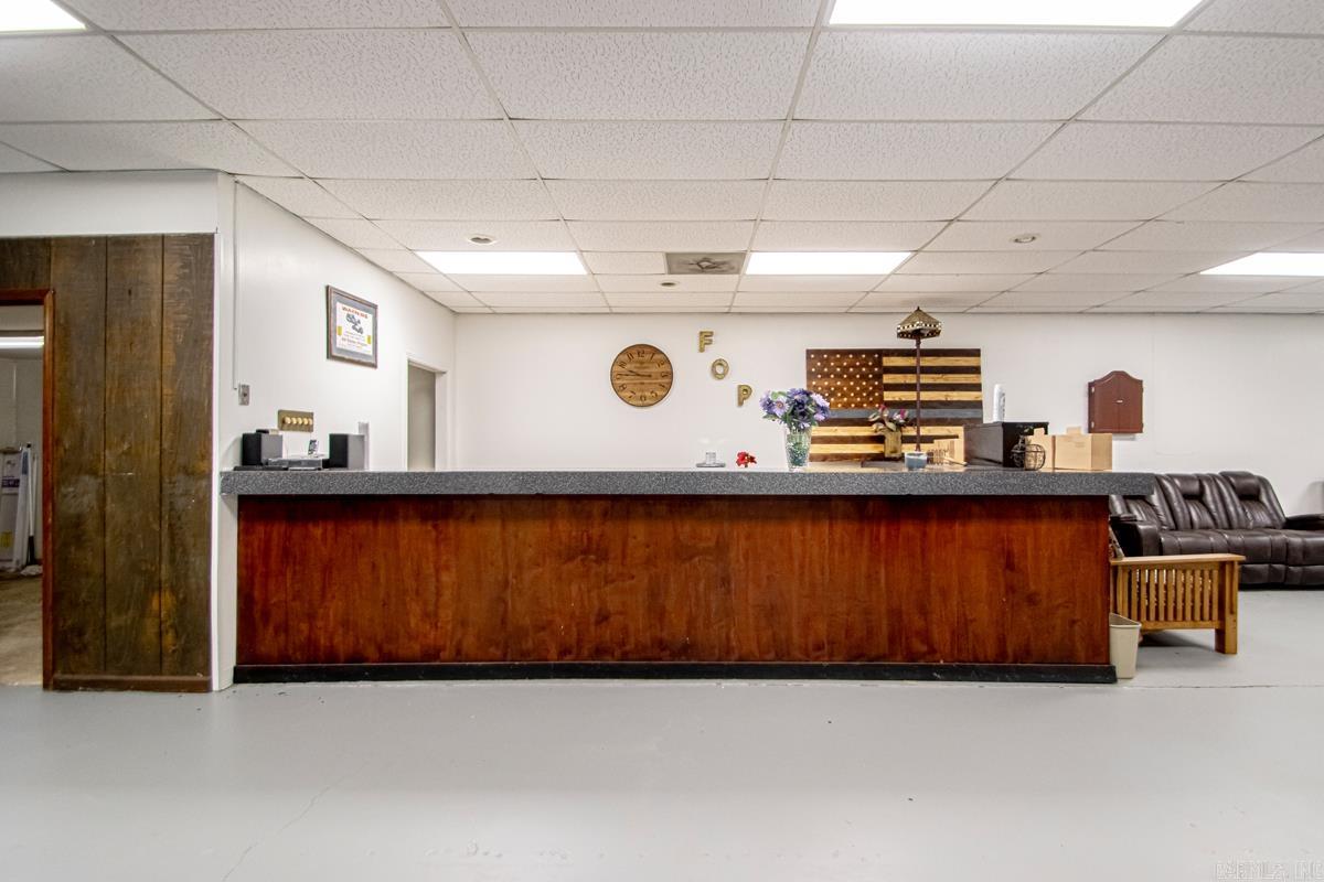 Excellent space for offices with a large meeting area, kitchen and restrooms. Sercutiy includes front door lock with passcode, plus 3 cameras installed. New gutters, plus metal roof screws were resealed less than a year ago. Large parking area.