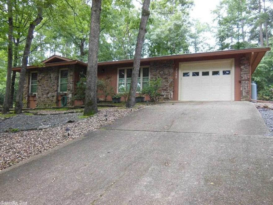 Nice 2 bedroom, 2 bath home on one level.  Vaulted ceilings add charm to this home with new windows and sliding door (Lifetime Warranty); other recent updates include newer roof and hvac; hot water heater, dishwasher, and laminate tiled floors.  Window treatments convey excluding curtains.