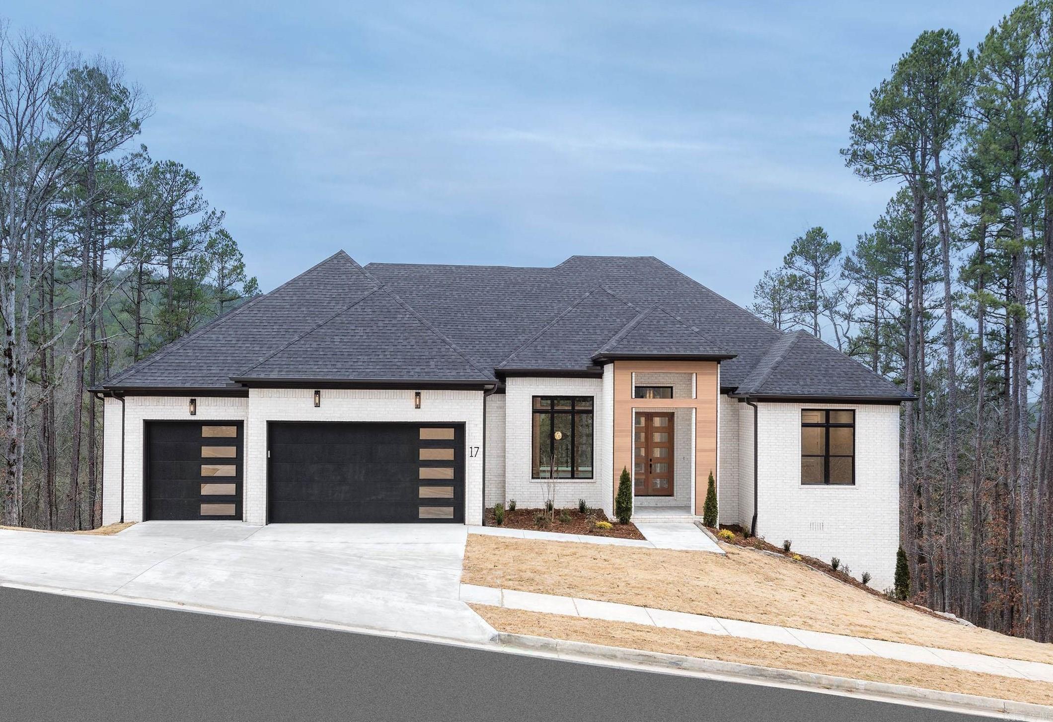Stunning new construction in Chenal Valley w/ luxury finishes & wonderful floorplan. Amazing Chef's Kitchen w/ high end appliances, double ovens, icemaker, pot filler, huge island & walk in pantry. Formal Dining & Eat In Kitchen + butler's pantry w/ bev. fridge. Master Suite w/spa-like bathroom & amazing closets. Home has 3 fireplaces in greatroom, upper & lower patios. Main Level covered patio w/ outdoor kitchen. Hardwood floors in bedrooms. Office + a Media Room w/ wet bar & bev. frig. See Agent Remarks.