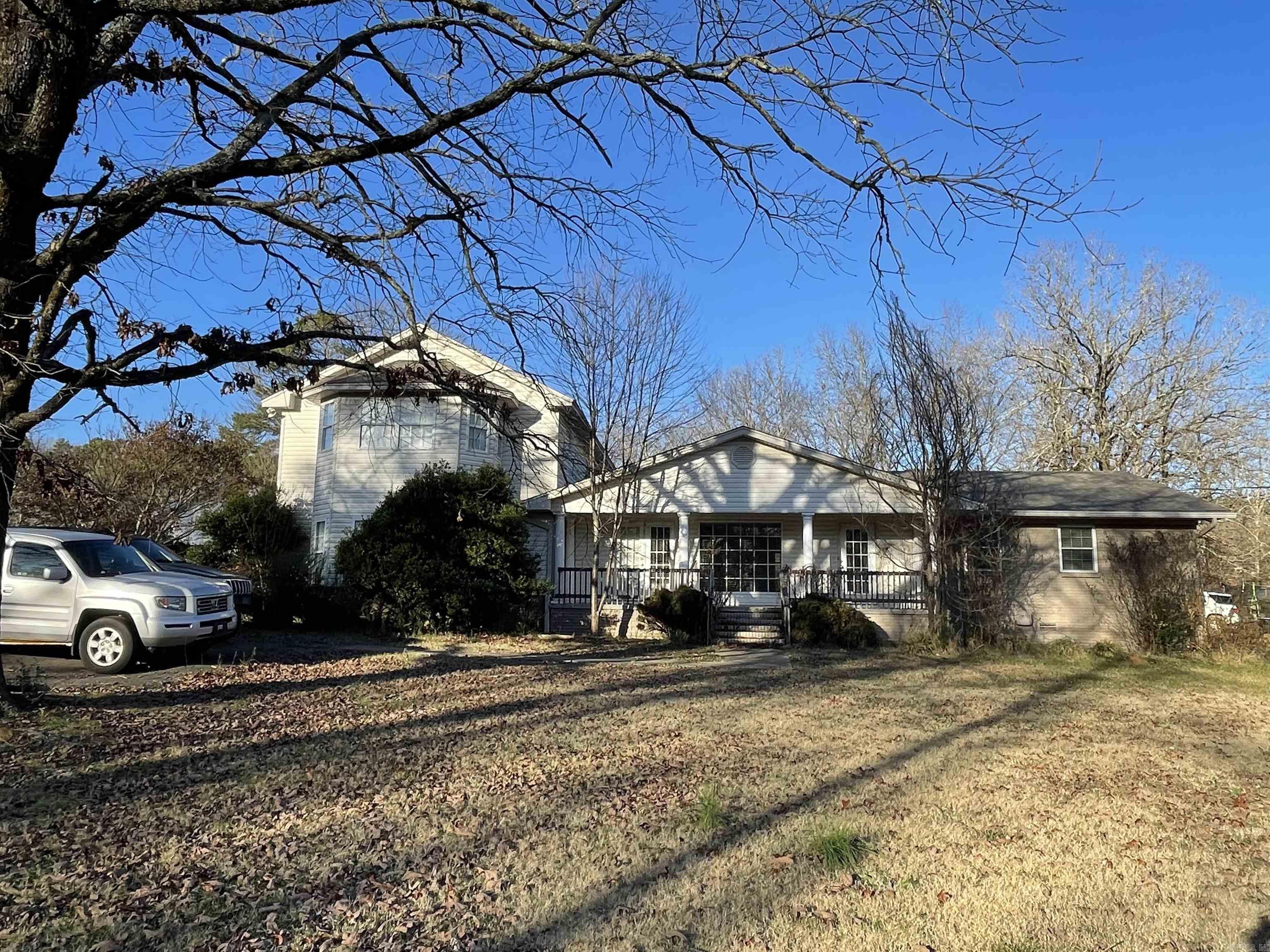 Welcome to 6401 Garrison Rd, a 4-bed, 4-bath home with an office, plus an additional property at 6375 Garrison Rd two houses on one lot! The main home is in good condition, with updated plumbing, a new well, and a recently cleaned septic system. It does need some cosmetic upgrades but has no foundation, plumbing, or electrical issues. This property offers plenty of space for living or rental potential. Don't miss the opportunity to make this your own in a great location!