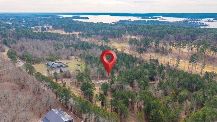 Approximately 4.45 ± acres of vacant land located outside the city limits. This property offers a rural setting with space for a variety of potential uses. Some utilities are available in the area but are not currently located on the property. Buyer to verify availability of utilities and any restrictions or requirements for development.