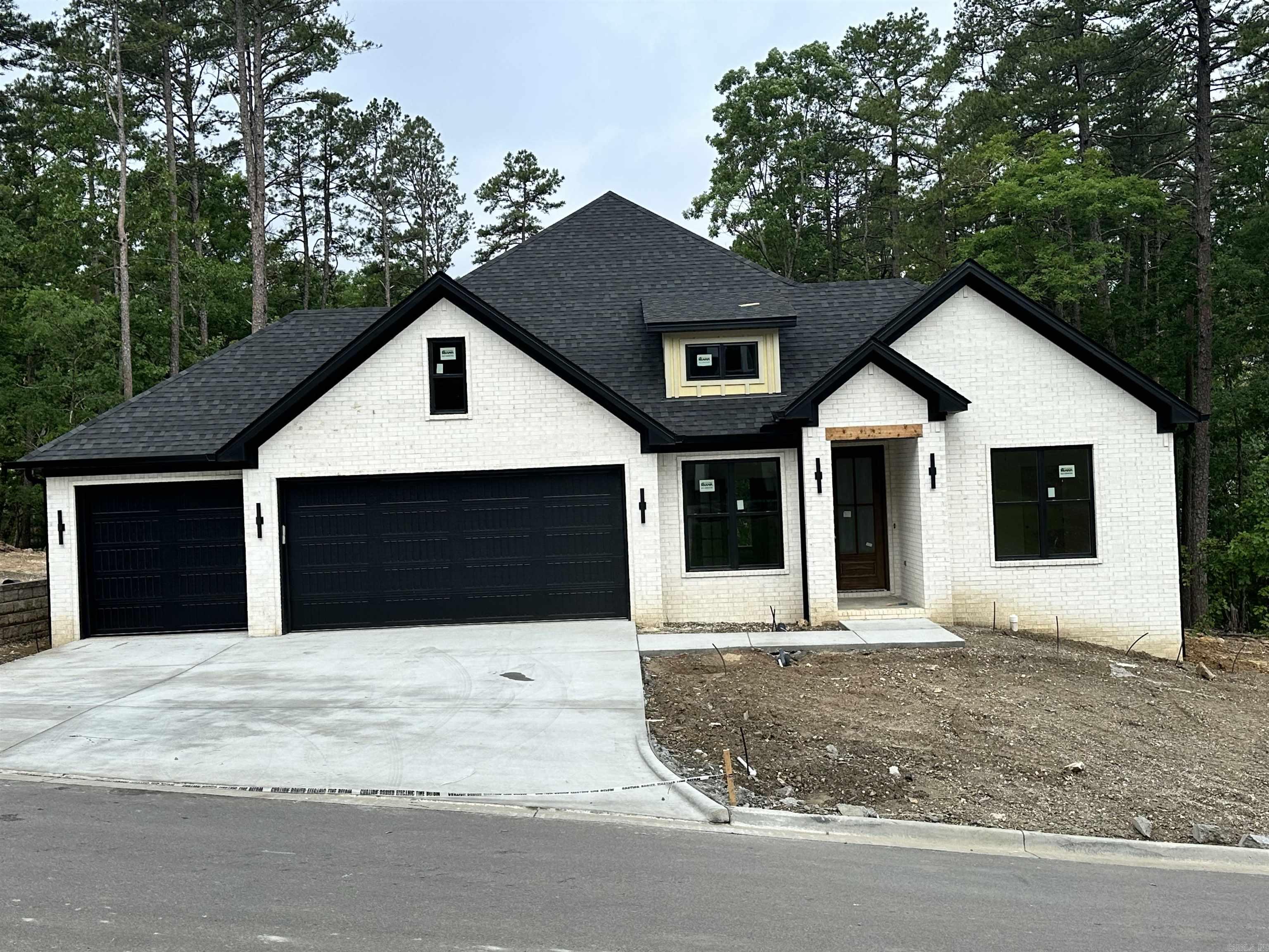 Beautiful 4 bdrm 2.5 bath home with 3 car garage. Enjoy the added privacy of the green space while sitting on the large covered back porch trimmed out nicely with wood ceilings and iron railing. Interior amenities include 10' ceilings in foyer, entry hall, kitchen, and large open family room with gas fireplace. Kitchen includes custom cabinets to the ceiling with a 36" gas range, stainless appliances, and walk-in pantry with Quartz countertops. Master bath includes oversized custom shower, soaker tub, large walk-in closet with entry from the laundry room. Floor coverings include LVP in all bedrooms and living areas with tile in the bathrooms. The home is in the final stages of construction and will be completed by the end of June 2025. Schedule your showing today!