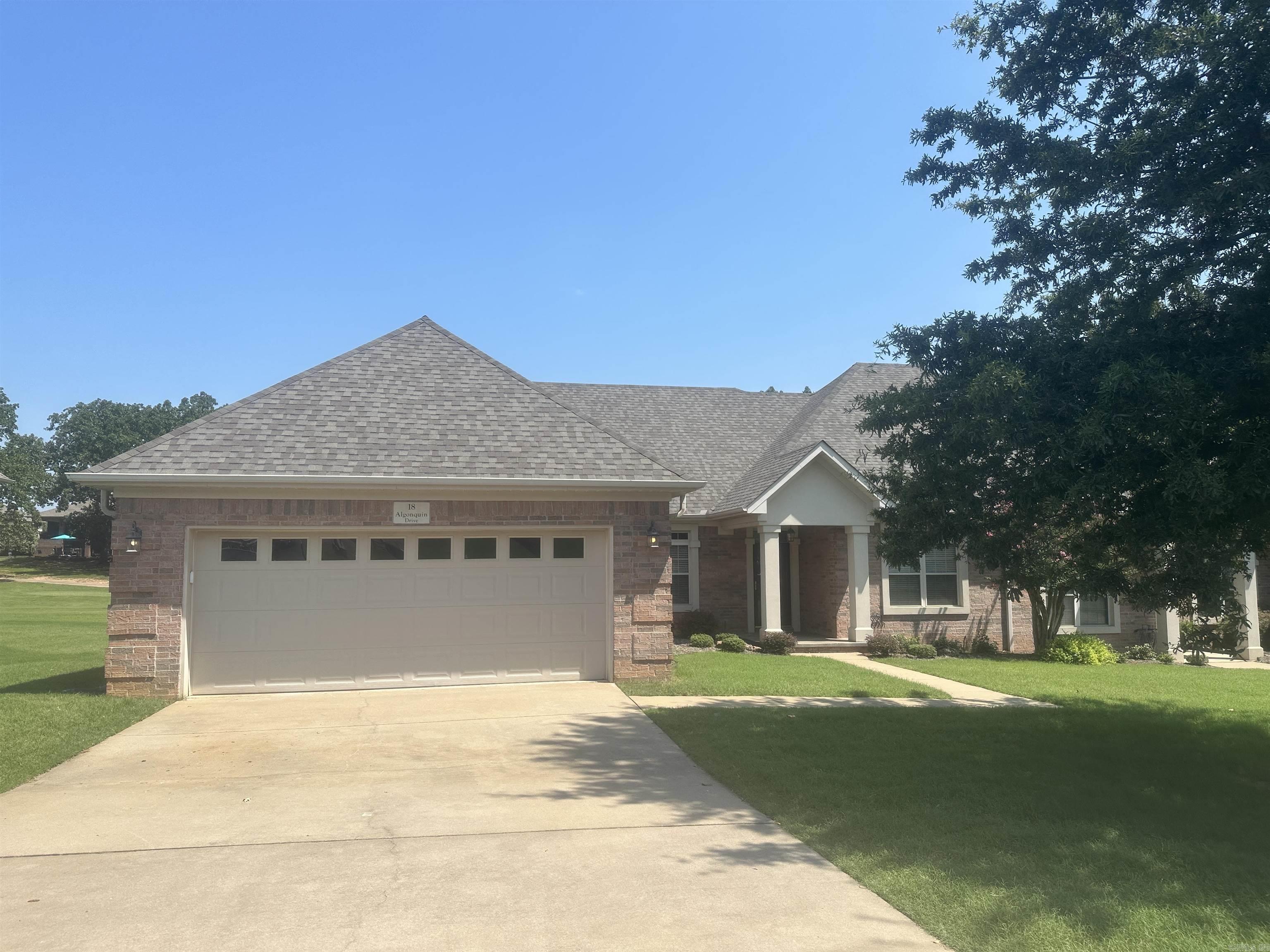 Walk into a serene atmosphere in the living/kitchen area overlooking the golf course. Enjoy the simple life! POA takes care of the yard maintenance and water for sprinkler system. Nice covered deck for morning coffee or family BBQs. Two master suites with big walk in closets and full bathrooms with jetted tubs and walk in showers. HUGE laundry room with sink and lots of storage closets. Kitchen features solid surface countertops, kitchen aid appliances, instant water on HWH, and beautiful cabinetry shelving around fireplace. New roof-6 mos old. Excellent condition and beautiful neighborhood.