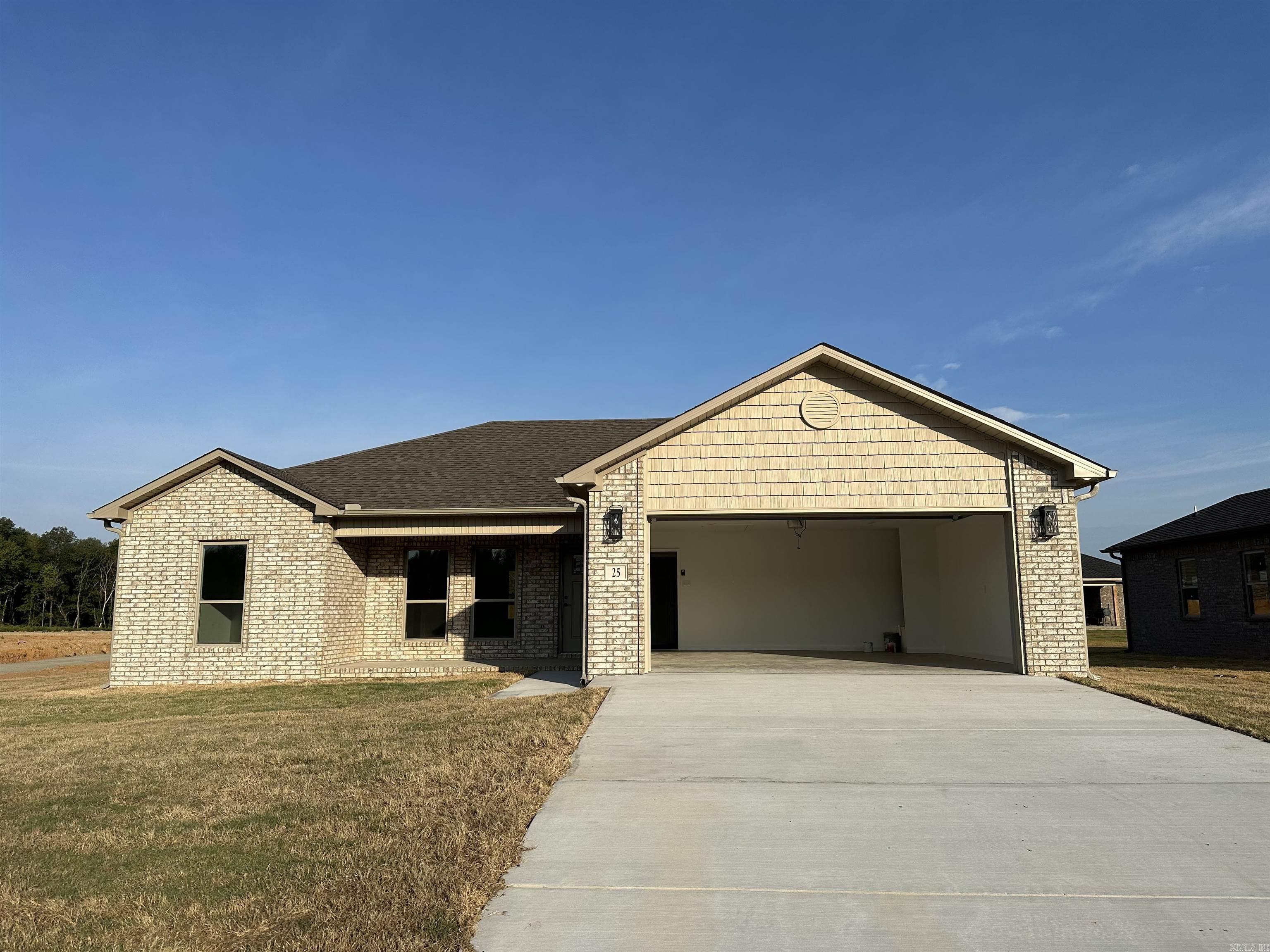 Country living close to the city. This beautiful all brick 3 bedroom 2 bath home has all the extra's! This island kitchen has granite counter tops, painted cabinets, farm sink, backsplash and BIG pantry! The master bedroom is big and has two closet! Tile shower with rain head shower head and double vanities! Laundry room has lots of storage! Luxury vinyl through out the house! No Carpet! Home is under construction. *** Pictures are of model home to show finishes.*** Call today!