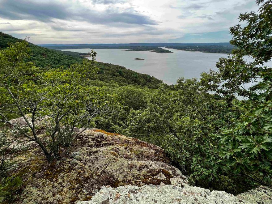 This property has a Magnificent Panoramic View! It Looks straight over “The Narrows” with views from the Narrows Bridge to Eden Isle. You can imagine building you home with a Large Deck to sit and adore the unbelievable View year-round with the Beautiful Greers Ferry Lake in front of you to the View of the Boston Mountains on the other side of the Lake or adore the bluffs below with abundant wildlife.  Revel in the view in this Quite Subdivision or appreciate the many things to do in the Areas from the Lake to Nature trails. A Great Place to Retire and Enjoy Life. This 1.64 acres in Diamond Bluff Estates is minutes from several boat launches, marinas, and a Private Airstrip less than 2 miles away.  This is a must-see Property.  Be sure and check out the unbranded Video above of the Views from the Bluffs.