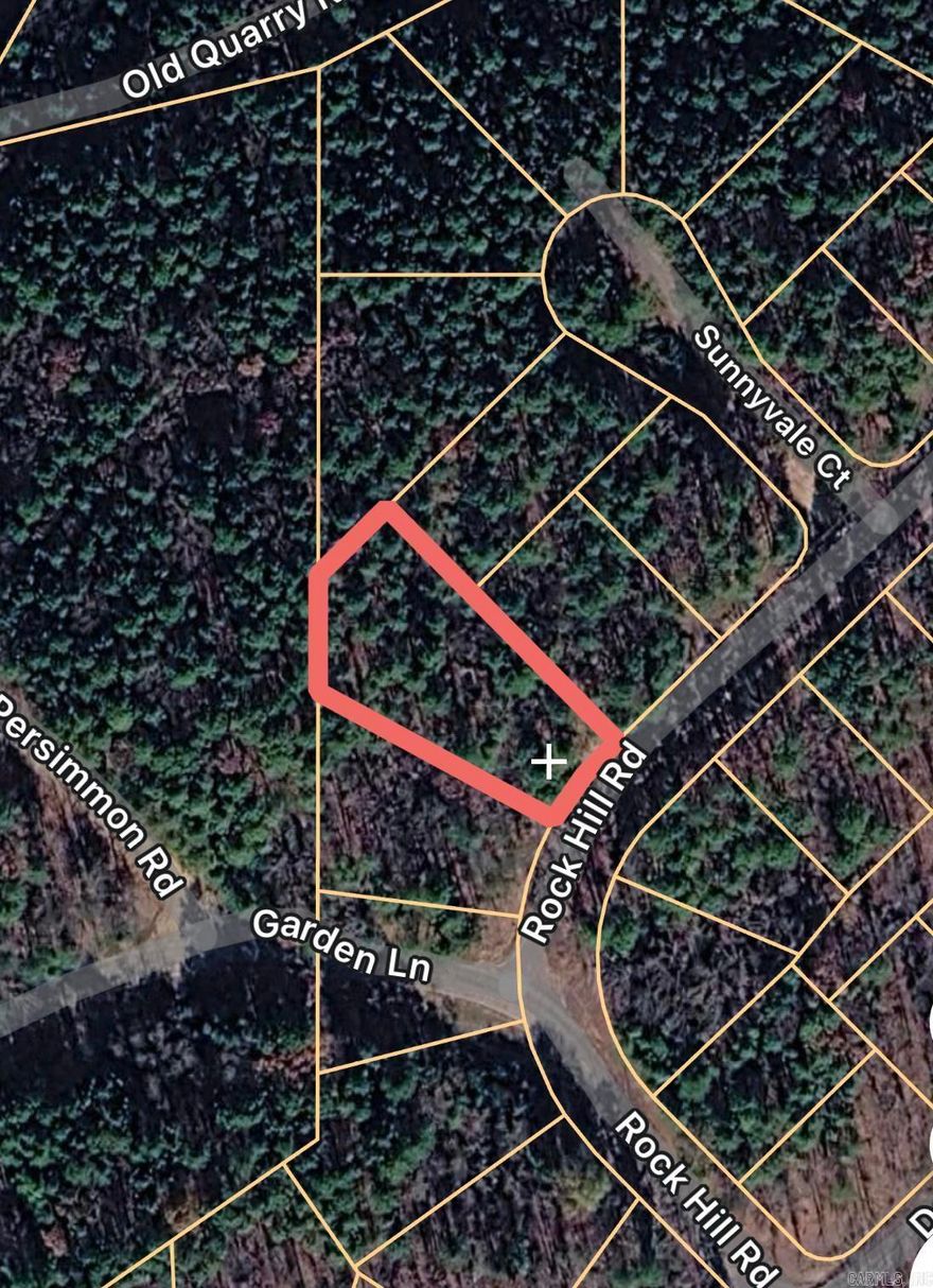 Build your dream home on this 0.41-acre lot located in the Indian Hills subdivision of Fairfield Bay. This residential vacant land offers a unique layout with paved road frontage along Rock Hill Rd and a sloped setting ideal for a custom build. Enjoy convenient access to area amenities including Greers Ferry Lake, golf courses, trails, and recreational facilities. Utilities are available nearby, making this a great opportunity for a primary residence, second home, or investment property.