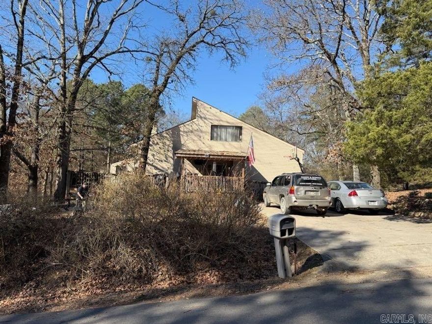 Located in a quiet rural setting, this property offers privacy, and exceptional potential. This 3-bedroom, 2-bath home features approximately 1,886 square feet of living space and was built in 1980, providing a solid footprint ready for updates and improvements. The layout offers generous room sizes and a functional floor plan, making it an ideal candidate for renovation. Fabulous sun room! Whether you’re an investor looking for your next project, a flipper seeking value-add opportunity, or a buyer ready to create equity with updates, this property presents a chance to customize and transform. Situated outside the hustle of town yet still convenient to Hot Springs amenities, the rural setting provides peace and breathing room — a rare combination with upside potential. Bring your vision and make it your own! No seller property disclosure.