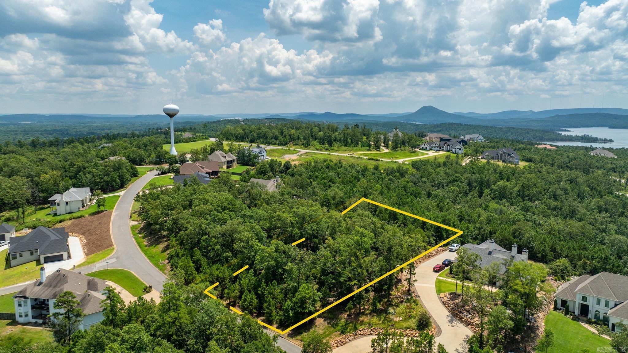 Nestled within the prestigious gated community of Waterview Estates, this exceptional 0.79-acre lot offers an unparalleled opportunity to build your dream home in a truly remarkable setting. The lot is beautifully positioned to capture breathtaking views of the surrounding landscape, providing a serene backdrop for daily life. Residents of Waterview Estates enjoy access to an array of upscale amenities, including sparkling pools, well-maintained tennis courts, and scenic nature trails perfect for hiking or leisurely strolls. The neighborhood's secure, tranquil environment makes it an ideal location for families and individuals seeking the perfect blend of luxury and natural beauty. Don't miss the chance to create a custom sanctuary in one of the most desirable communities around.