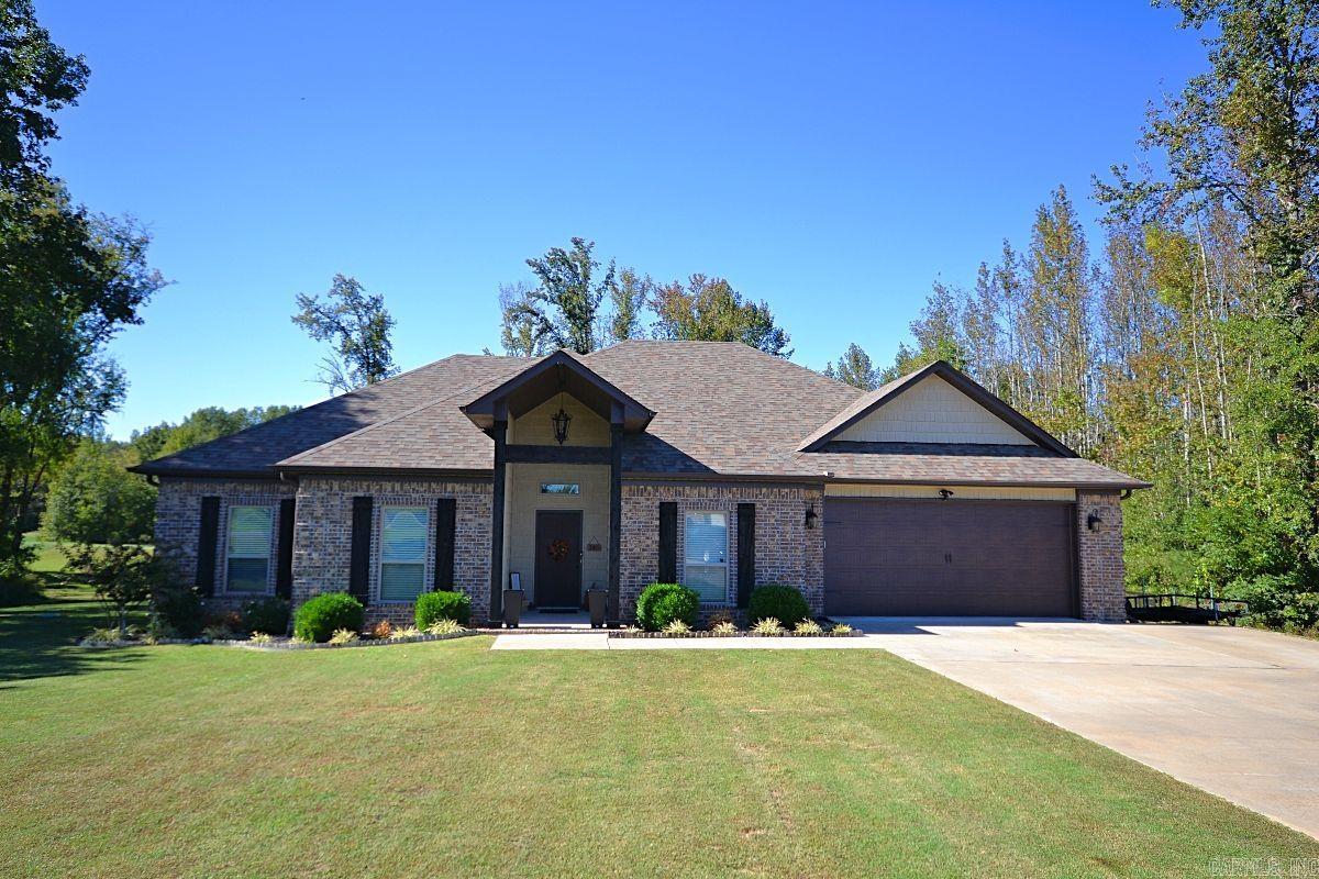 Nestled in a serene neighborhood, this beautiful 4-bedroom, 2-bathroom split plan home sits on 1.61 acres of flat land, offering plenty of space and privacy. Built in 2018, this modern home features an open-concept design, perfect for entertaining and everyday living. Step inside to a welcoming living area with a stunning fireplace that creates a cozy ambiance. The kitchen boasts elegant marble countertops, an oversized sink, stainless appliances including a new dishwasher. With a new roof and HVAC recently installed, this home is move-in ready! The backyard is as far as the eye can see with a smaller area enclosed by an iron fence, providing a safe boundary for kids or pets. Enjoy your mornings or evenings on the covered patio. This property offers the best of both worldsāspacious acreage in a neighborhood setting. Don't miss the opportunity to own this peaceful retreat! Agents see exclusions in remarks.
