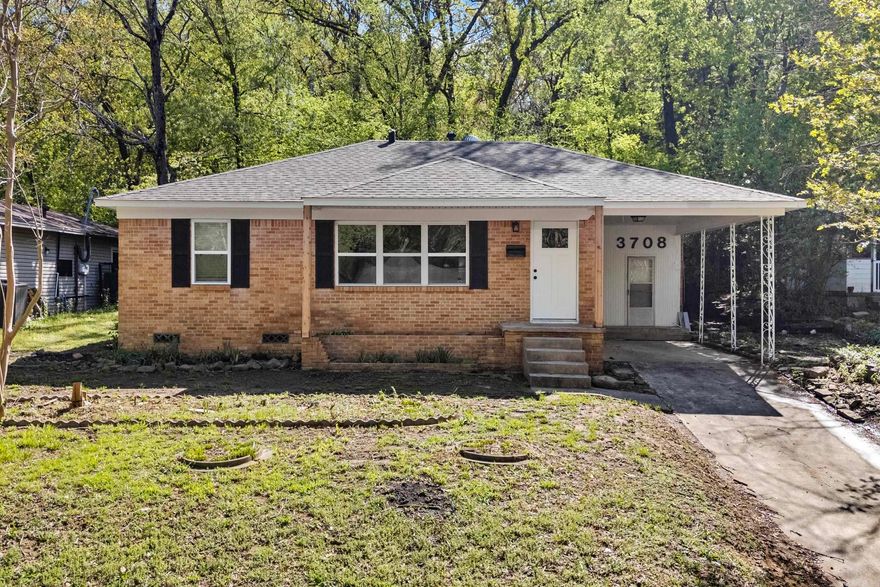 Move-in ready and beautifully updated! This charming all-brick home features a brand new roof and new electrical service. Inside, you'll find fresh paint throughout, luxury vinyl plank flooring, and modern finishes. The kitchen shines with new cabinets, backsplash, and stainless steel appliances, opening to a spacious living area - perfect for entertaining. The large second living space provides great flexibility for a den, playroom or home office. The primary bedroom offers new carpet, a ceiling fan and a private ensuite with stylish tile shower and new vanity. Two additional bedrooms share an updated bath with new tile, tub/shower, and vanity. Check this one out today!