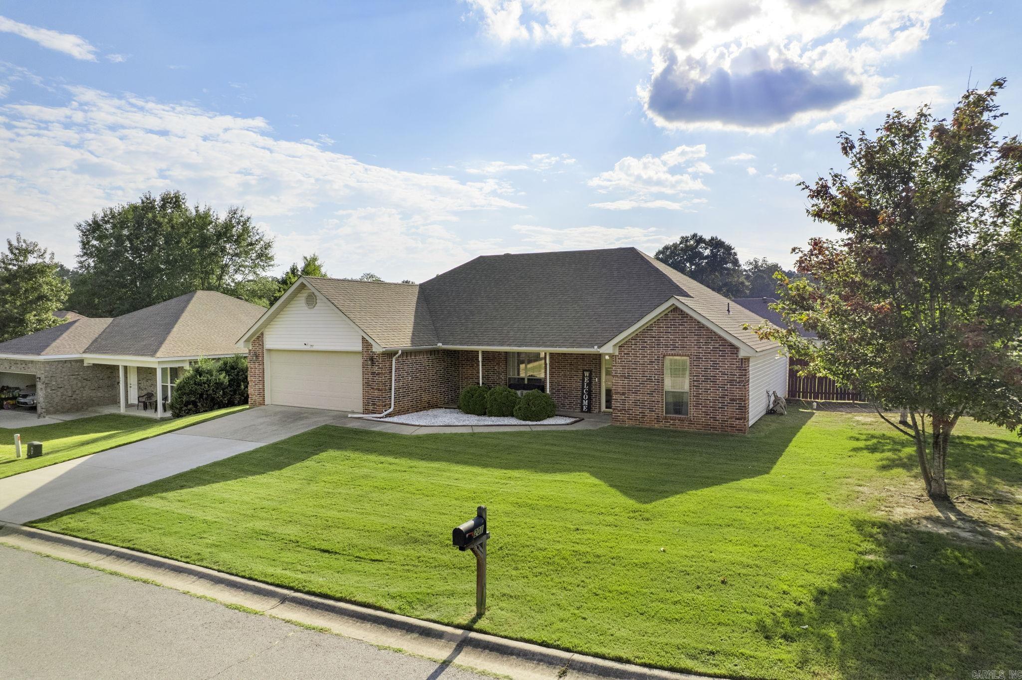 Discover the charm of 201 Pope Dr! Nestled on a 0.25 acre corner lot, this beautifully maintained home offers the perfect balance of comfort and convenience. Step inside to find 3 inviting bedrooms and 2 full bathrooms, with vaulted ceilings that make the living spaces feel bright and welcoming. The two-car garage provides plenty of storage, while the large, fully fenced backyard is ideal for cookouts, playtime, or simply unwinding outdoors. Move-in ready and thoughtfully cared for, this home is ready to welcome its next chapter. Don’t miss out, schedule your showing today! Agents see remarks