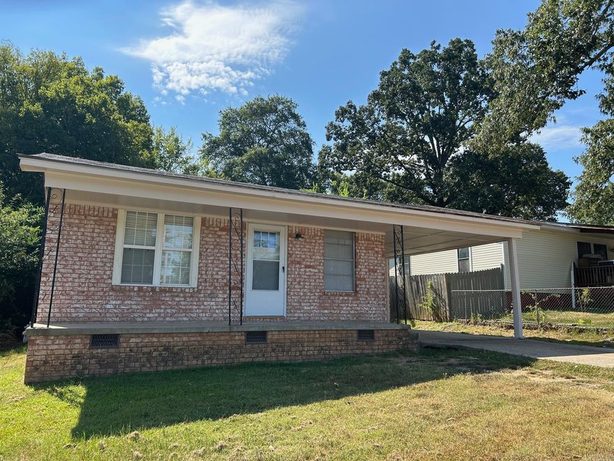 Newly updated and refreshed, this all brick one level has 3 BRs and one BA.  Updates include all new paint and flooring throughout, new counters in kitchen, new vanity & commode in BA, new lighting, and new front and laundry room doors. Tile floors in kitchen and bath. Spacious living rm opens to eat-in area and kitchen. Separate laundry & store room off carport. Large level fenced backyard. Seller never lived in the home. No disclosure available. This is an inherited property. See Sell Input Sheet. Great investment property or move in ready first home!