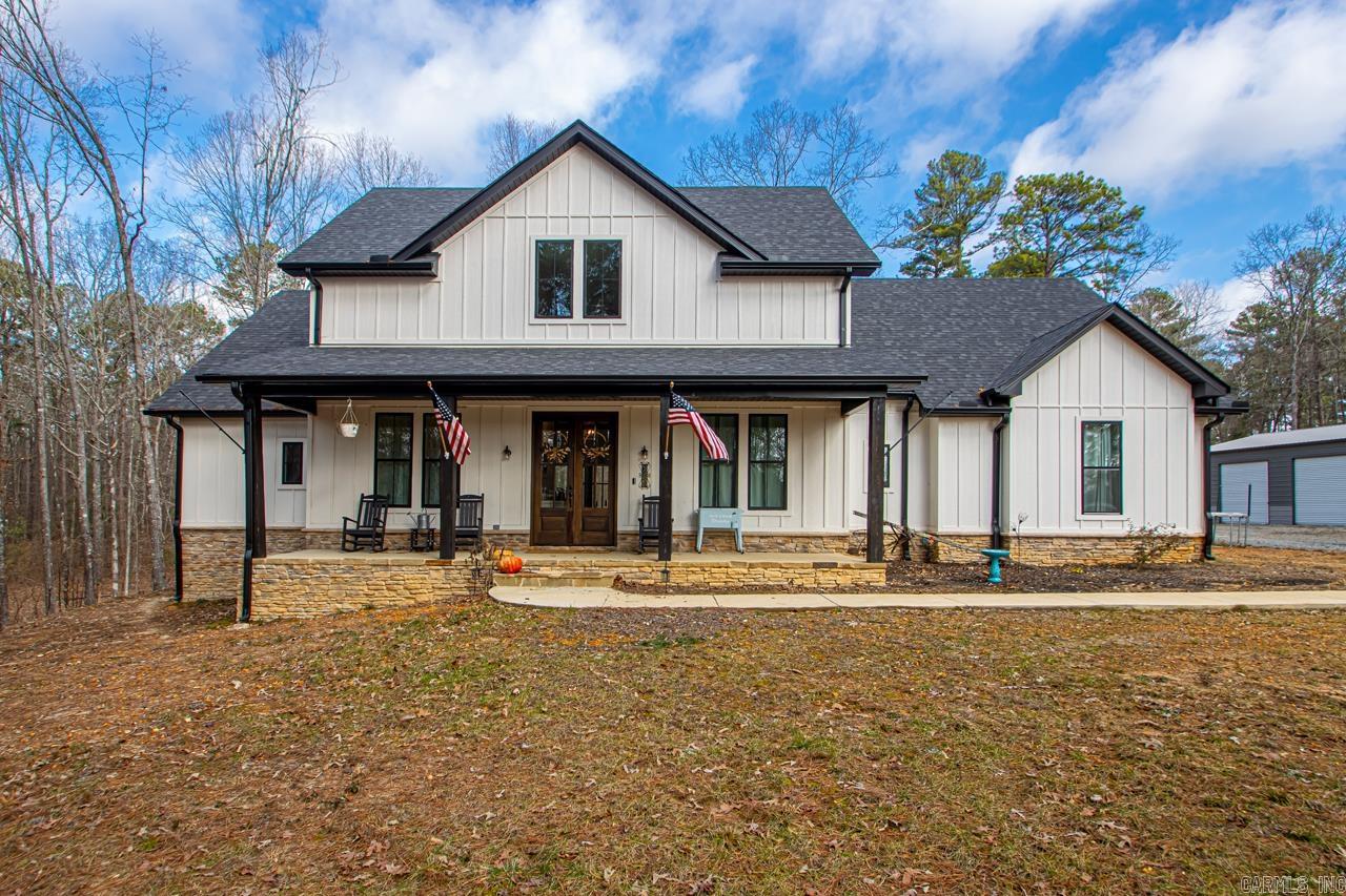 Introducing 631 Zoa Way! This gorgeous 4 bedroom, 3 1/2 bath home and 30x40 shop both sit on 18 beautiful acres that provide privacy and tranquility that most dream about. This home has an amazing floorplan featuring extra large primary bedroom, bathroom, closet and a massive bonus room compete with its own 1/2 bath for convenience. The interior of this home is simply beautiful and full of custom touches but if you ever feel like enjoying the outdoors the back porch is the place to be with a wood burning fire place and the large hot tub that conveys with the home! Parking and storage may never be an issue thanks to a large three car garage and insulated shop that is wired with tons of LED lighting. If homesteading is your thing you will certainly appreciate the livestock pen and all the opportunities the 18 acres provides. Properties like this don't come along everyday so contact your local agent today to schedule a private showing!!