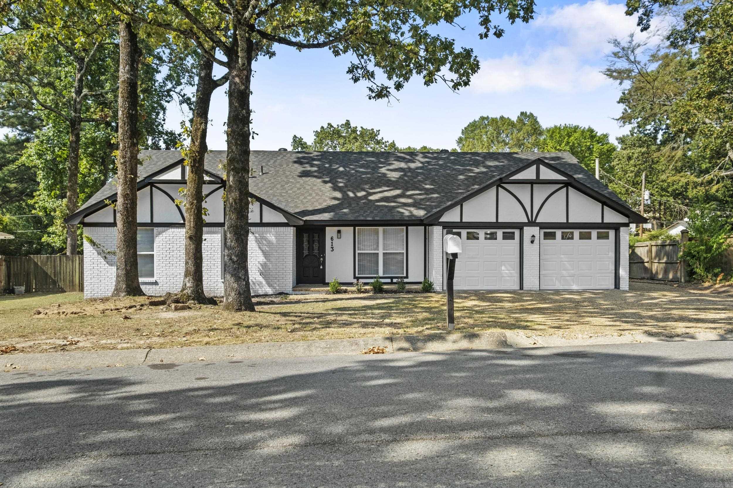 This spacious 4 bedroom, 3 bath home offers a thoughtful layout with plenty of room for everyday living and entertaining. The primary suite and two additional bedrooms are conveniently located on the main level, along with a welcoming living room featuring woodburning fireplace and vaulted ceilings, a separate dining area and bright eat-in kitchen. A versatile front room provides the perfect spot for a home office or sitting room. Upstairs you will find a private retreat complete with a game room, bedroom and full bath--ideal for guests, teens or extended family. Enjoy the outdoors on the covered back porch overlooking the level backyard, including a single-car garage/shop perfect for hobbies or extra storage.
