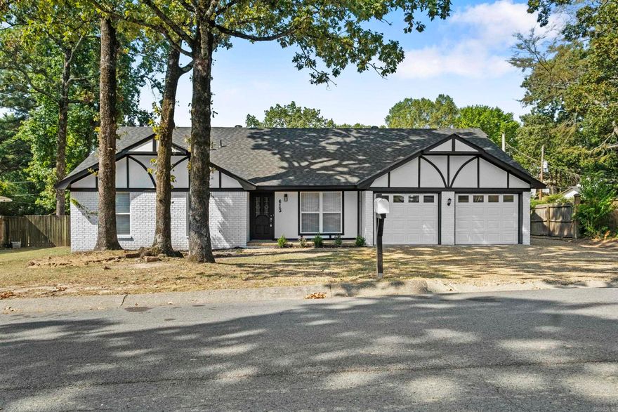 This spacious 4 bedroom, 3 bath home offers a thoughtful layout with plenty of room for everyday living and entertaining.  The primary suite and two additional bedrooms are conveniently located on the main level, along with a welcoming living room featuring woodburning fireplace and vaulted ceilings, a separate dining area and bright eat-in kitchen.  A versatile front room provides the perfect spot for a home office or sitting room.  Upstairs you will find a private retreat complete with a game room, bedroom and full bath--ideal for guests, teens or extended family.  Enjoy the outdoors on the covered back porch overlooking the level backyard, including  a single-car garage/shop perfect for hobbies or extra storage.