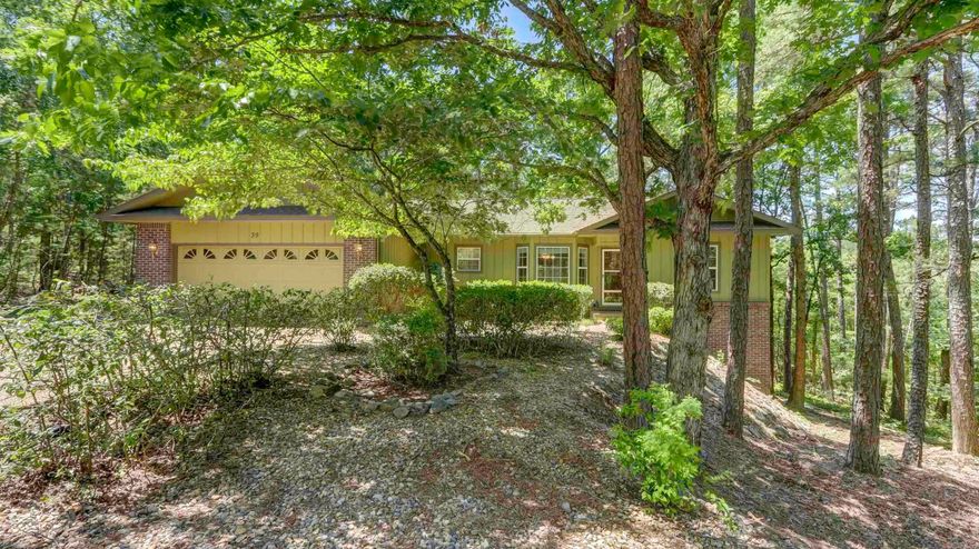 Looking for a home with privacy and seclusion? Then this 3/2, 1,741 square foot house may be just what you are looking for. Refrigerator stays, outdoor hot tub stays, new kitchen stove, new carpet in bedrooms, tile in the kitchen, hard wood flooring in living room, and fresh paint. 2 porches to further enjoy your privacy. Absentee owner with health issues so property being sold AS IS. AGENTS: See Remarks.