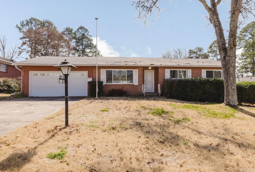 Welcome to this incredibly well-maintained home in the heart of Little Rock! You're greeted by gorgeous original hardwood floors as you enter the living room and natural sunlight floods the house. The LR is open to the kitchen with a large eat-in area and pantry space. The 3 Bedrooms are on one side of the home, all with hardwood flooring. The garage has a spacious storage/work area inside of it, as well as a storage shed in the backyard. There is a covered patio as you step through the sliding door to the backyard and a small privacy fence blocking you from neighbors as you relax on the patio. This home has a newly installed tankless water heater. All windows have been replaced in the last few years with double pane windows. The crawlspace has also been sealed up with a dehumidifier placed there. This home is completely move-in ready and in a fantastic location!