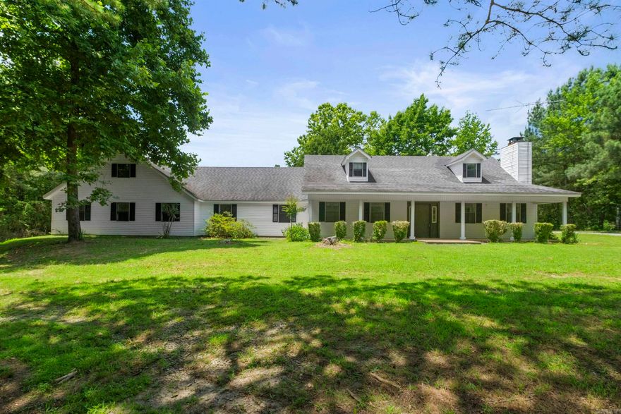 Great opportunity in the heart of Rose Bud.  2 unrestricted private acres with 2,747 sq ft home.  3 Bed 2 Bath with lots of possibilities.  2 living areas, large bonus room and lots of storage.  Office with outside entrance, could serve as an additional bedroom or living area. 3 car garage and outside storage buildings. Nice private lot with mature trees. Just across the street from the school.  Walk to school and all the school functions.  School also has a community safe room for bad weather conditions. Economically priced AS-IS.  Home is ready to move in or make changes to make it your own.