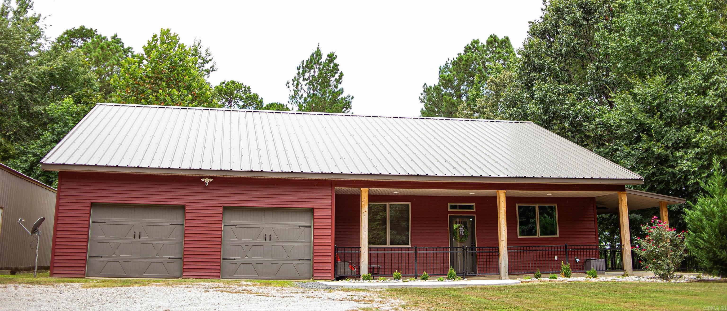 Discover this stunning home tucked away along the peaceful South Fork of the Saline River. Thoughtfully designed to blend modern comfort with natural beauty, this riverfront property offers a truly one-of-a-kind setting. Perched above the river, the home is solidly constructed with a thick concrete foundation, red iron framework, and durable steel sidingābuilt with longevity in mind. Inside, you'll find two spacious bedrooms and bathrooms on the main level, with an additional bedroom and full bath upstairsāperfect for privacy and guests. The oversized master bathroom features separate his-and-hers areas that meet at a shared walk-in shower. Soaring vaulted ceilings and expansive windows flood the open living and dining areas with natural light, while wrap-around porches provide breathtaking views of the river from every angle. Cozy up by the wood-burning fireplace on cool nights, creating the perfect spot for relaxing or entertaining. A two-car garage, a 30x40 workshop, and an attic offer ample room for vehicles, tools, and recreational gear. This exceptional property is ideal for anyone seeking both serenity and functionality in a scenic location.