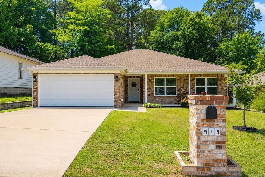 Start your next chapter in this beautiful 3-bedroom, 2-bath home, offering 1,510 sq. ft. of open living space. Built in 2019, this move-in ready home features gorgeous wood flooring throughout the main living area and a cozy gas fireplace that creates the perfect gathering space. The kitchen is designed for both function and style with granite countertops, stainless steel appliances, an apron-front sink overlooking the living area, and a refrigerator that conveys with the home. Granite countertops continue throughout both bathrooms, adding a cohesive modern touch. Enjoy the convenience of a dedicated laundry room, a two-car garage, and a fully fenced backyard perfect for pets, play, or entertaining. Located near the heart of historic downtown Benton, you'll love the convenience and character that this home brings.