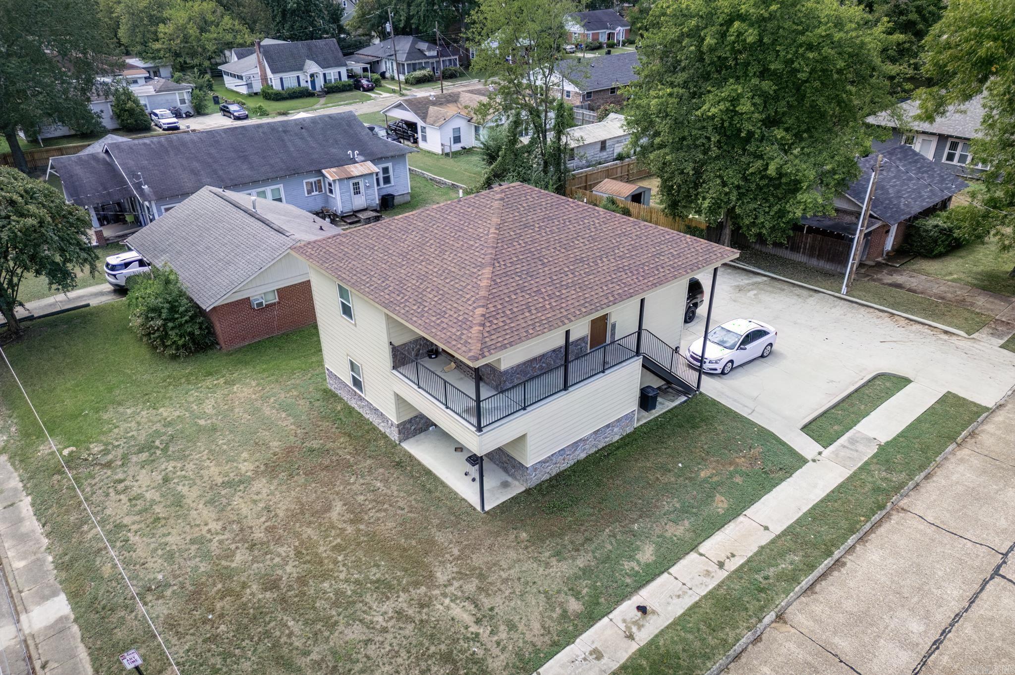 This modern 3-bedroom, 2-bath duplex, built in 2019, offers an ideal investment opportunity located directly across the street from Henderson State University. The property features an open-concept design with spacious living areas, beautiful granite countertops, and durable stained concrete flooring throughout. With plenty of parking available, this duplex is perfectly suited for student housing or rental income. Its prime location and modern amenities make it an investor's dream.