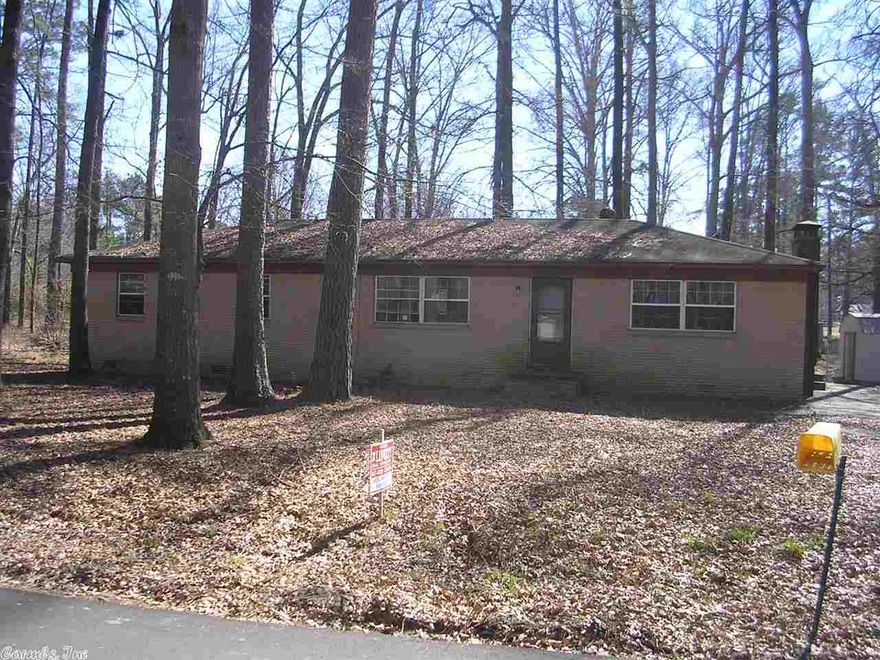 Bank Owned!  Needs Work!  Look at the Price!  Large living room, large kitchen dining, large laundry, large den with wood burning fireplace, 3 bedrooms, 2 baths, huge fenced lot.  Bryant Schools!  You gotta bid on this one at auction.com