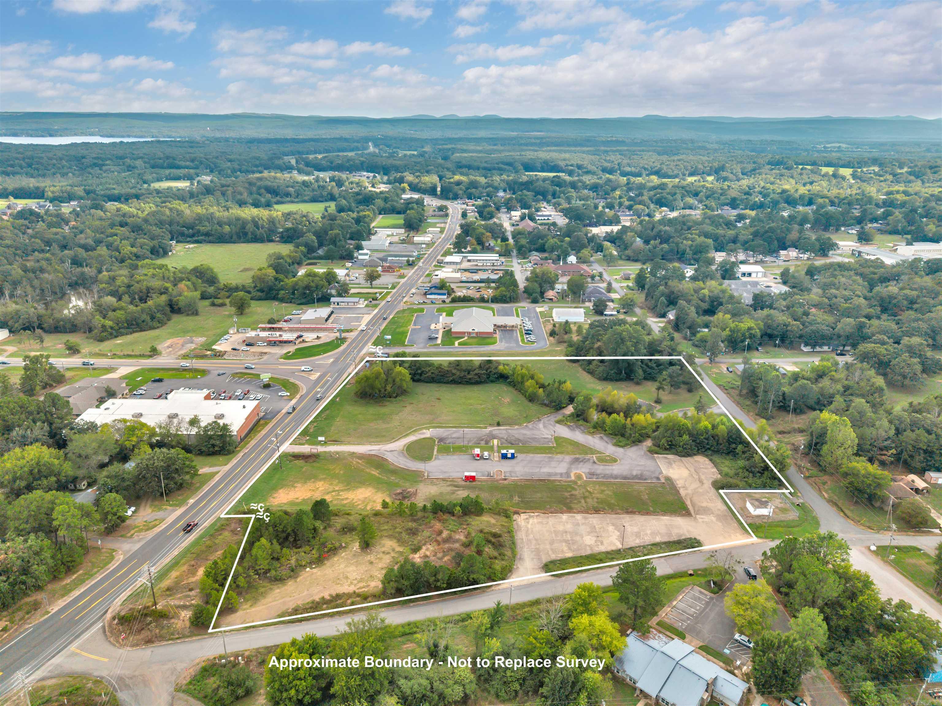 Great commercial acreage in a high-traffic area in the heart of Perryville, AR! This 7.75 acres already has paved parking throughout. As the county seat of Perry County, Perryville is home to numerous county offices, adding to the areaās steady flow of daily visitors. This site offers excellent visibility and accessibility. This acreage would really support any type of commercial or multi-family development. Land is currently used to rent food truck spaces. Electrical, water & sewer are on the property.