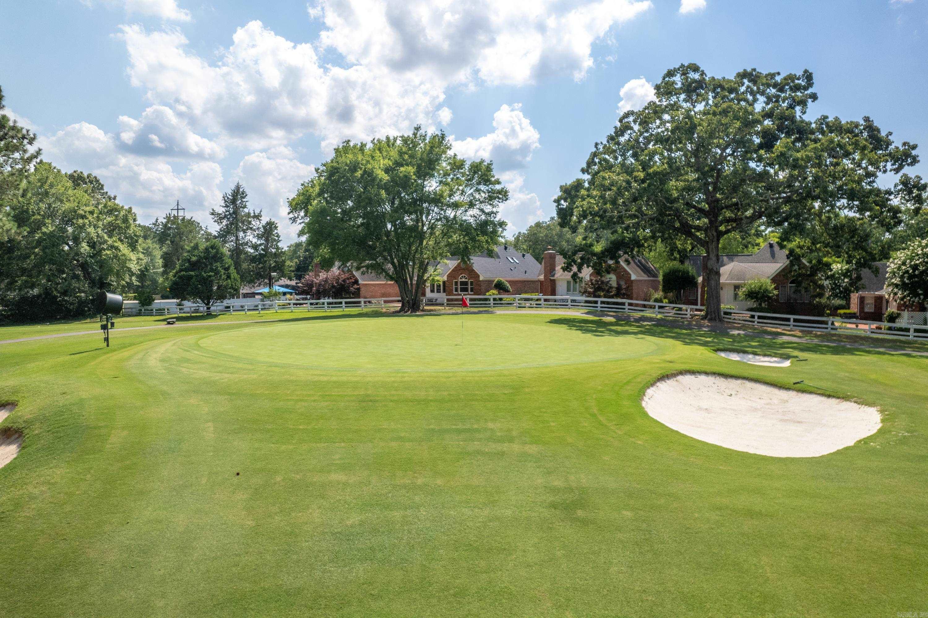 THE BEST OF GOLF COURSE LIVING! Enjoy INCREDIBLE golf course views in both directions in this TOTALLY UPDATED 2,761 sq ft, 3 bedroom, 3 bath home right on the Hot Springs Country Club golf course. Overlooks the green on hole #4 and the tee box and fairway of hole #5 of the Park Course. New paint throughout, new kitchen, new master bathroom and guest bathroom, new appliances, new lighting, new landscaping and new exterior doors, completed in 2023. Large, open-concept kitchen, dining, living areas. Master suite with amazing golf course views and 1 guest bedroom with bathroom on main level. Upstairs features 1 bedroom, bathroom, living room/game room & media room/office. 2 car garage.