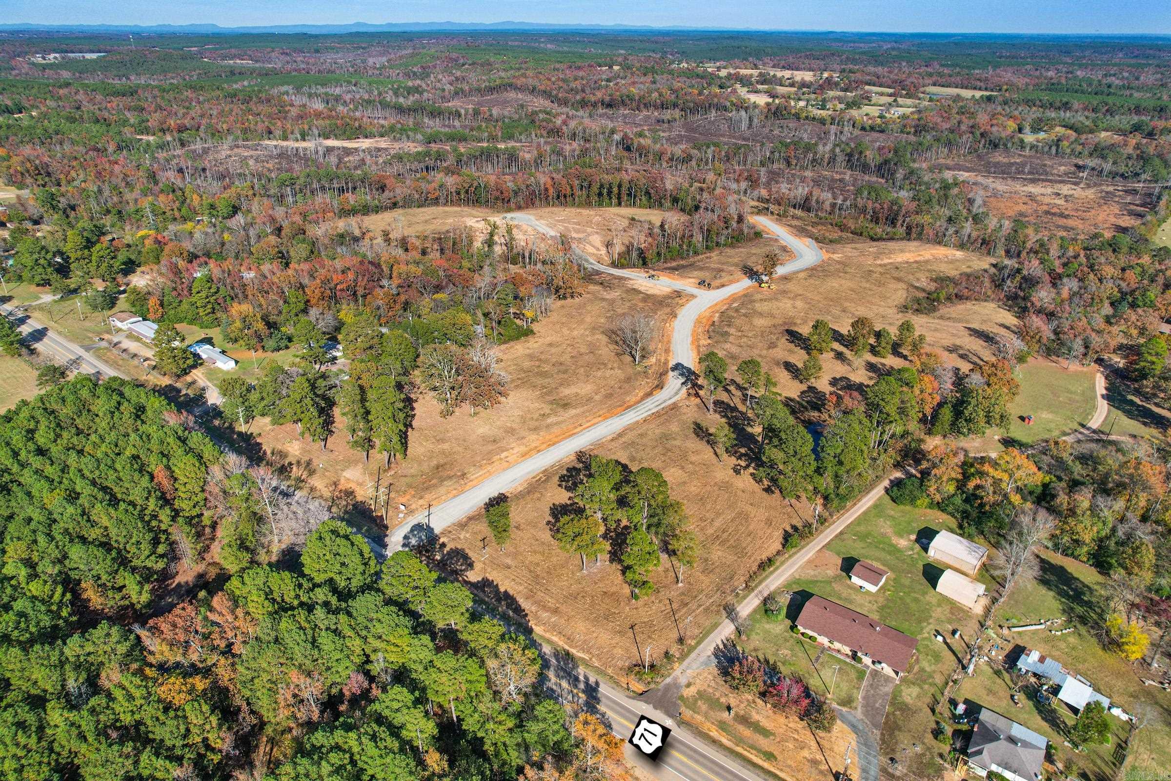 Located just north of DeQueen's city limits in beautiful Sevier County, Rolling Oaks is the ideal subdivision for your new home. This charming community offers essential amenities including county water, gas, and underground electric, ensuring both comfort and convenience. With its picturesque rolling landscape, this is the perfect setting to build your dream home. Don’t miss this opportunity to embrace a serene lifestyle while being close to city amenities! *Restrictions and Covenants attached*