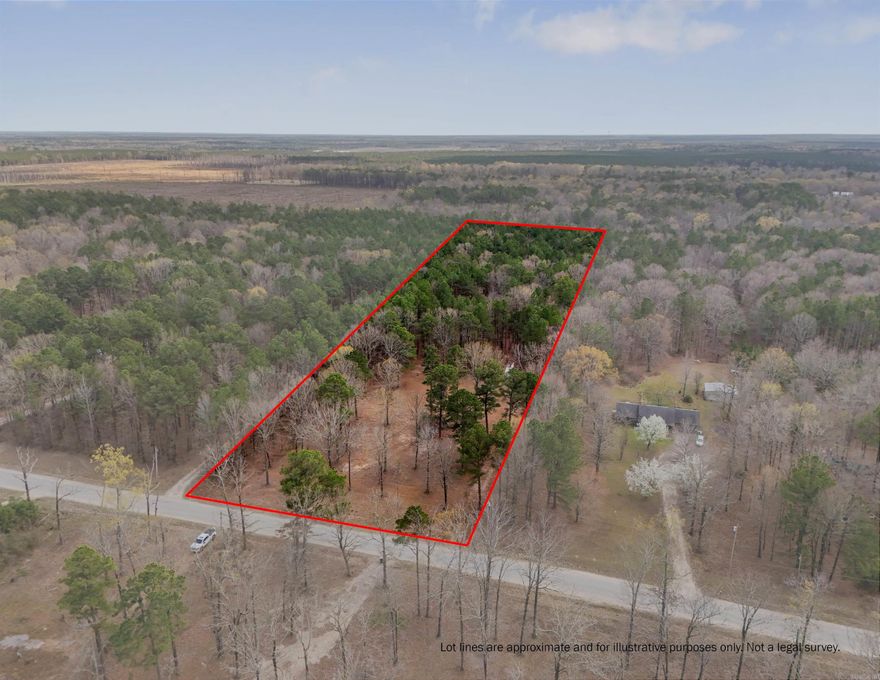 Looking to build outside the city limits? Here is 6.8 acres - cleared for building - with electricity and water already present on the property. There is also a storage building that has a bathroom area inside. Call today for more information!