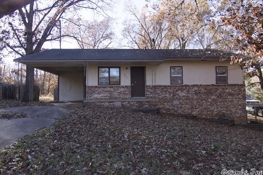 This 3 bedroom, 1 bath home features a brick and wood exterior on a spacious corner lot.   Lots of storage underneath in the partially finished basement area.   Close to all local amenities!   Priced to sell!