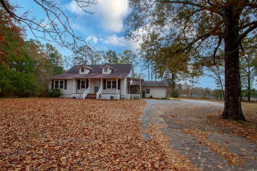 Welcome to your opportunity to transform this spacious 4-bedroom, 3-bathroom home into your dream retreat.  Nestled on over 3 acres in pristine Saline County, this property offers endless possibilities for those with vision and a love for nature.  Imagine the potential for gardens and outdoor activities?  The home features a large family room, dining area and cozy nooks, perfect for entertaining or relaxation.  Some of the photos in this listing have been virtually staged. Book your showing today!