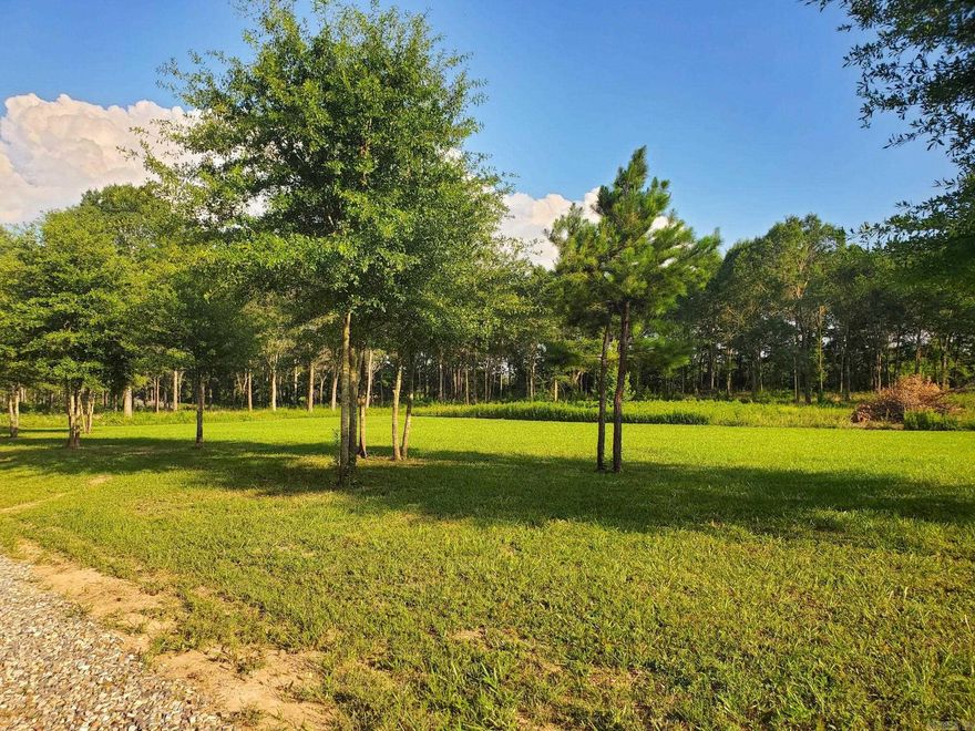 Beautiful wooded acreage. Creek on property.  All utilities available (city water, sewer, & electricity).  Will sell a 10.51acre tract, 9.31 acre tract, 14.11 acre tract or all.  All tracts have access to Hwy 8 East and Hwy 375 East - to the 4 wheeler trails.