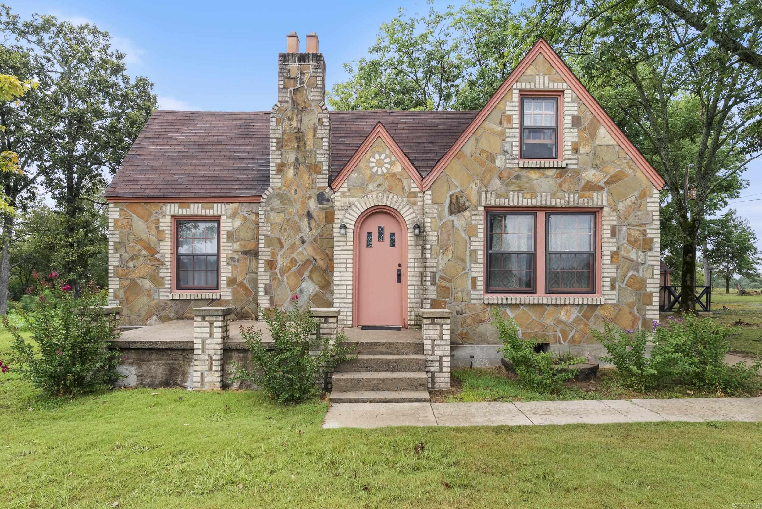 This beautiful 3-bedroom, 1.5-bath home is full of character and charm. Built in the late 1940's, it features a timeless stone exterior and sits on over an acre in a peaceful rural setting. Inside, youāll find a spacious layout with a cozy living area, a full basement offering plenty of storage or workspace, and a bonus room upstairs that can serve as a home office, playroom, or extra bedroom. With its historic charm, solid construction, and plenty of space inside and out, this property is a rare find. Perfect for those who love the quiet of the country while still being close to town.