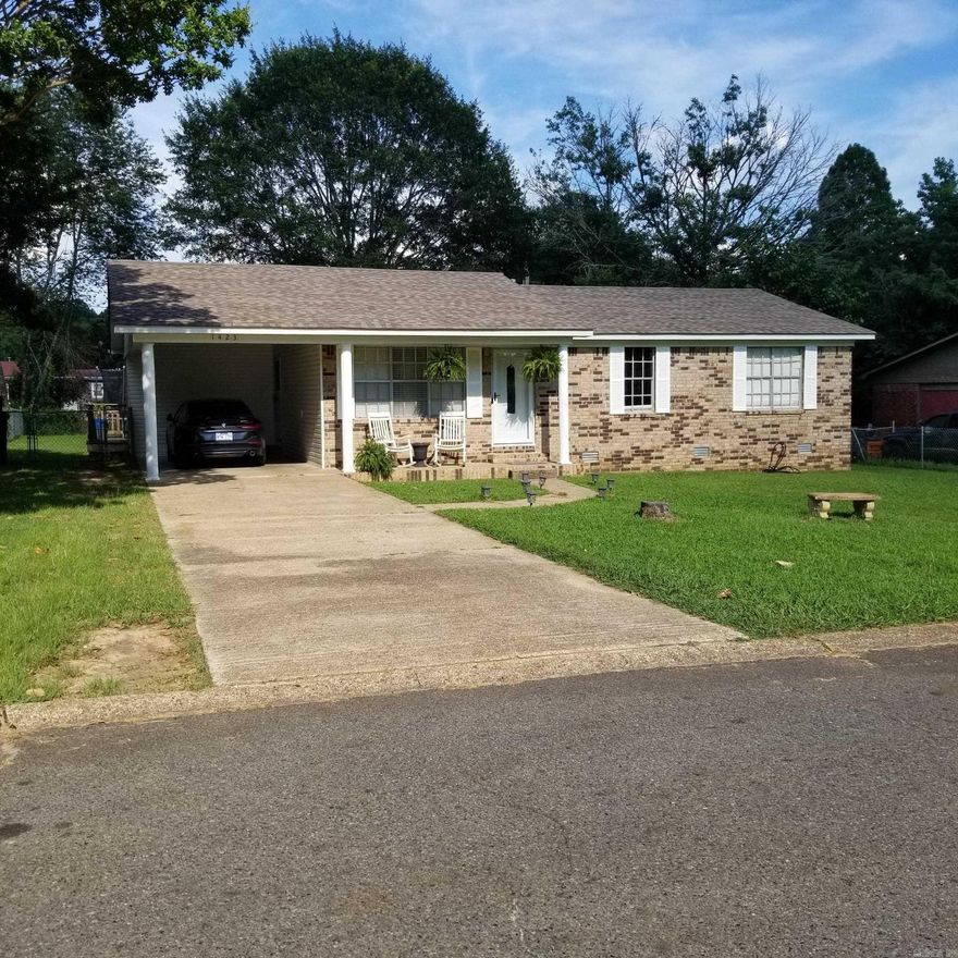 Thinking of a first time homebuyer or couple looking to downsize check out this adorable 3 bedroom that is move in ready.  Nice subdivision with an average sized low maintenance lawn that has chin link fencing. This could be the property that you could be looking for. Relax on the wood deck afternoon leisure time.  Features include single carport with outside storage, CH&A, recent upgrades to the roof, water heater, etc. Call for an appt. to tour.