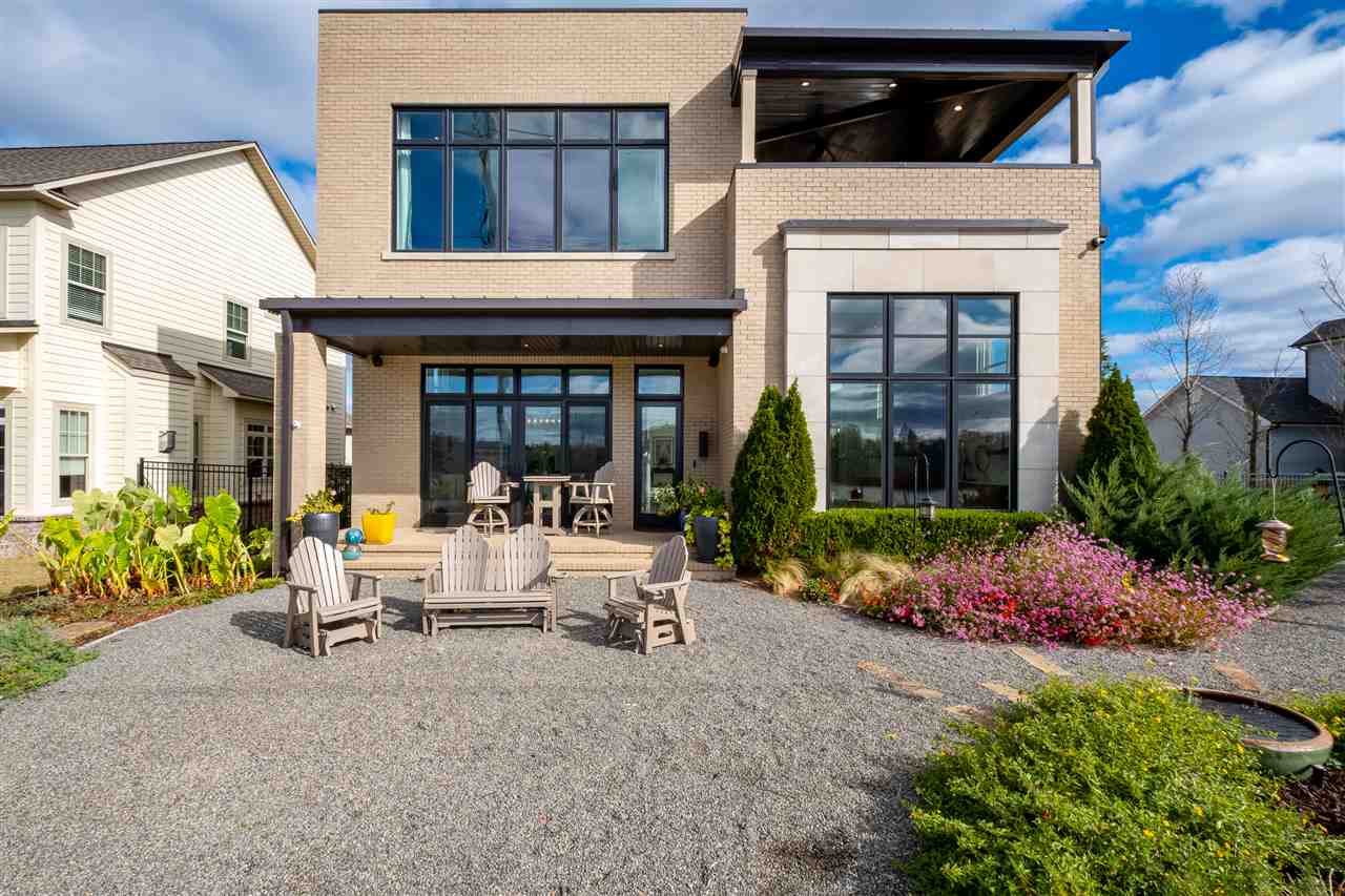 Come enjoy this modern riverfront home nestled on the Arkansas River Trail in Rockwater Village. Amazing home for entertaining with open floor plan, chefs kitchen, gas italian stove/oven, tall ceilings, dramatic lighting, large windows with sweeping river views, private courtyard complete with firepit and water feature. Upstairs master has a covered private patio with fireplace. Access to marina, dog park, and all the community has to offer.
