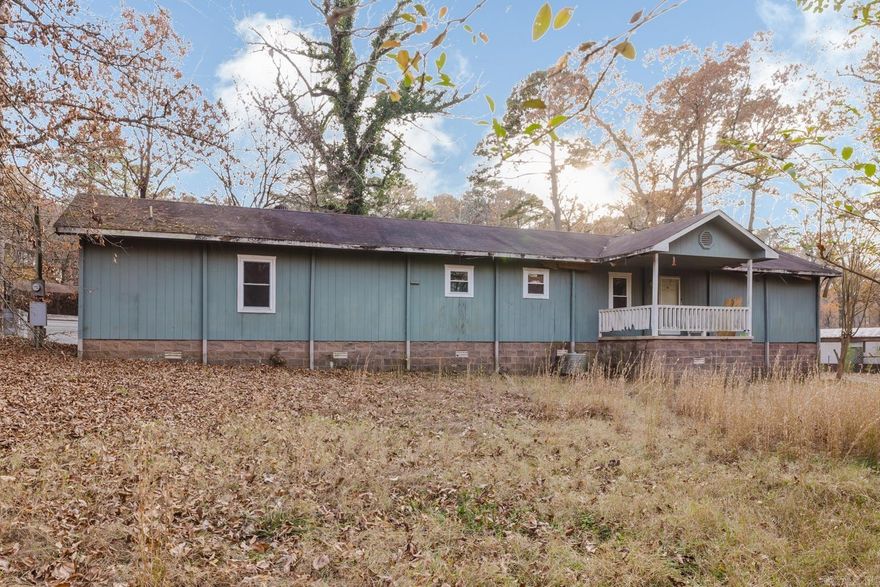 Discover peaceful country living in a prime Bryant location on 1.77 acres! This 3 bed, 2 bath manufactured home on a permanent foundation offers space, privacy, and fantastic extras. Property includes a 16x24 shop building with wood-burning stove, electrical, a large loft, and a covered hanger—perfect for projects or storage—plus a 12x24 utility building and a stock pond great for fishing! Enjoy multiple outdoor living spaces with a covered front deck, large covered back patio, and a 10x14 sunroom for year-round enjoyment.Step inside to an inviting open floor plan with new LVP flooring (no carpet!), abundant natural light, and a spacious living room open to the dining area and kitchen. Kitchen features a gas stove, ample cabinets and counter space, built-in dinette, and double sinks with sprayer. Split primary suite offers a large walk-in closet, double sinks, and a linen closet. Laundry room connects to the sunroom with access to the covered back porch. Property also includes a tornado shelter and sits on a quiet dead-end road with new construction and growth coming to the area. In the sought-after Bryant School District - Springhill, Bethel, Bryant Jr High & High School!