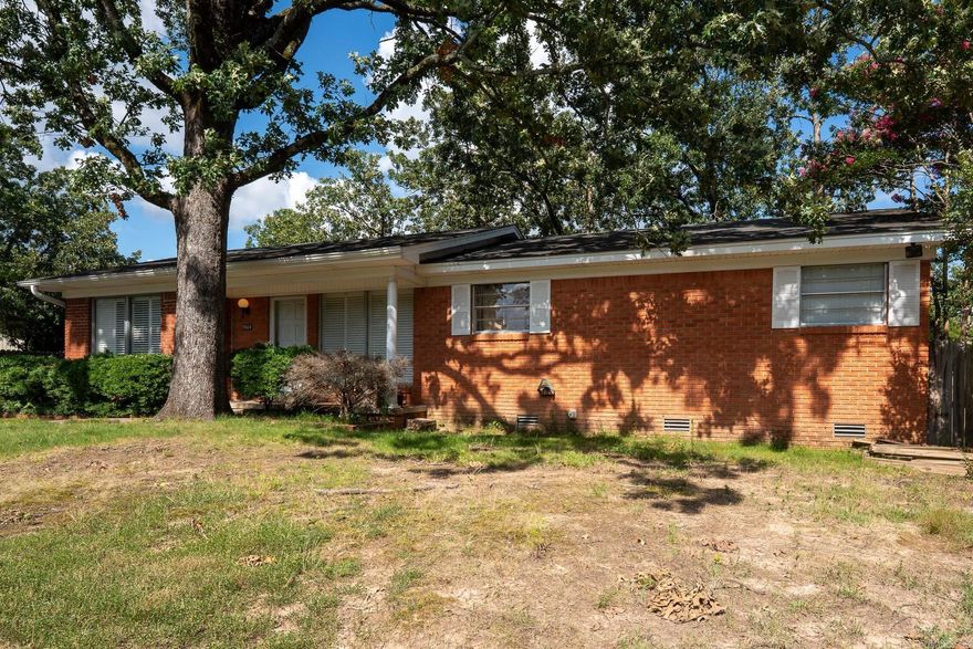Welcome to 5104 North Cedar, located in the desirable Park Hill subdivision of North Little Rock. This beautifully updated one-level home offers 3 bedrooms, 2 full bathrooms, plus a spacious bonus area and a light-filled sunroom—providing versatile space for work, play, or relaxation.  Inside, you’ll find a thoughtful blend of modern updates and original charm. The kitchen features granite countertops and tile flooring, while the bonus room and sunroom also showcase stylish tile finishes. Fresh paint throughout and original hardwood floors in the main living areas and bedrooms give the home a warm, inviting feel.  The large bonus room is perfect for a second living area, home office, or media space. Enjoy your morning coffee or unwind in the cozy sunroom overlooking the backyard.  Outside, there's extra parking with a carport and an additional storage area that’s ideal for a workshop or hobby space. The fenced backyard offers great outdoor potential for entertaining or relaxing.  Located just minutes from downtown, shopping, schools, and parks, this move-in ready gem in Park Hill is ready for its next chapter. Don’t miss it—schedule your private showing today!