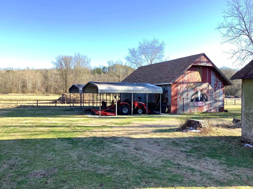 Fountain Lake School District on 1.02 acres, with barn/workshop, covered RV parking, +more. This home has a spacious living room with vaulted ceiling and gas log fireplace. Kitchen and dining area with plenty of cabinets and gas range. The basement has a tall ceiling with interior and exterior entry that offers a versatile area that could be used for storage, crafts, or converted into extra living space. Large covered back deck overlooks the lush yard surrounding the home and the barn adds a touch of rustic charm. Outside city limits. New roof on barn December 2024.