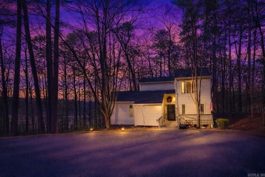 Enjoy Lake Ouachita living from this furnished 1,867± sq ft, 4-bedroom, 3.5-bath condo in the gated Silver Point Subdivision in Mount Ida, bordering U.S. Army Corps of Engineers land near the shoreline.  Surrounded by woods, this freestanding condo offers a sense of privacy, seasonal lake views, and a convenient setting for outdoor recreation. Whether swimming, boating, fishing, or simply relaxing, this location offers a lakeside lifestyle.  Highlights include a wood-burning fireplace with a two-story stone surround, a stone walk-in shower with heated floors, granite countertops, and quality finishes throughout, including hand-scraped hardwoods, slate tile, and wool carpet. Enjoy a screened porch, large deck, and community amenities such as a pool, cabana, and onsite caretaker. POA dues are reported to cover water, trash, and exterior upkeep, supporting a low-maintenance getaway.  Twin Creek Recreation Area is about 1.2 miles away and includes a public boat launch, swim beach, campground, and fishing pier. The Lake Ouachita Vista Trail (LOViT) is nearby for hiking and mountain biking. About 15 minutes to Mount Ida and 30 minutes to Hot Springs.