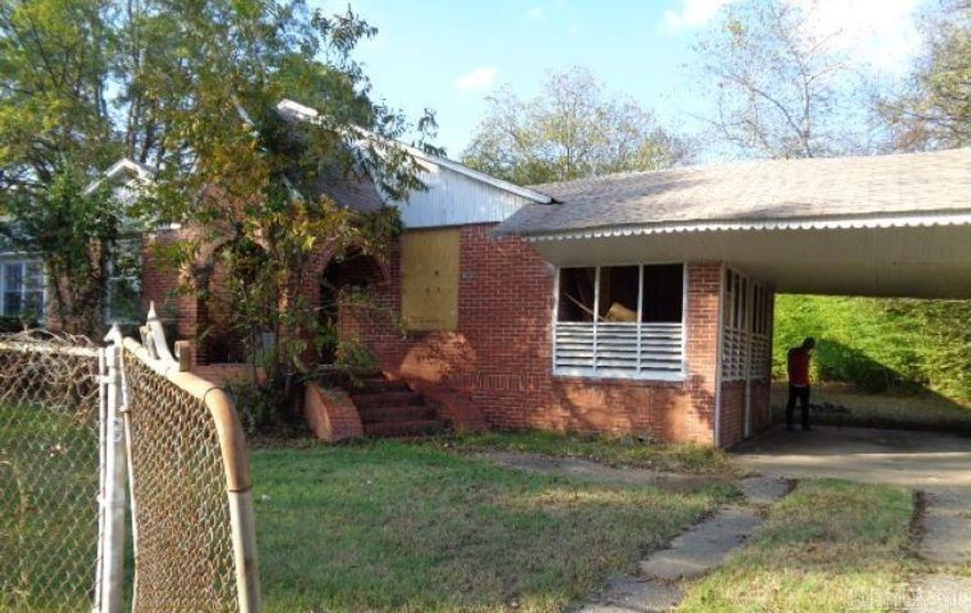 Brick one level home located on a level fenced lot. House to be sold "AS IS". Agents please read confidential remarks before showing.