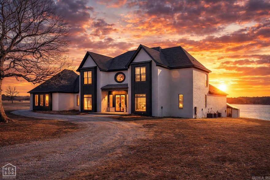 Built as the builder’s personal residence, this nearly 7,000 sq ft lakefront estate in Terra Hills offers exceptional craftsmanship, scale, and privacy rarely found in Northeast Arkansas. Just four years old, the custom home features 6 bedrooms, 6 bathrooms, a finished basement, and a resort-style pool, delivering true luxury living on the water.  The open-concept main level includes a spacious living area, chef’s kitchen, formal dining room, wet bar, wine room, office, laundry room, and a private primary suite, plus an additional guest bedroom. Upstairs and a fully finished basement provide generous space for guests, recreation, and private retreats while maintaining a cohesive flow throughout the home.  Outdoor living shines with a resort-style pool, expansive patios, and peaceful lake views that create a true private estate setting. Located at 1777 CR 759 in Terra Hills, this thoughtfully designed lakefront home represents a rare opportunity to own luxury at a scale and quality seldom seen in the Jonesboro area.