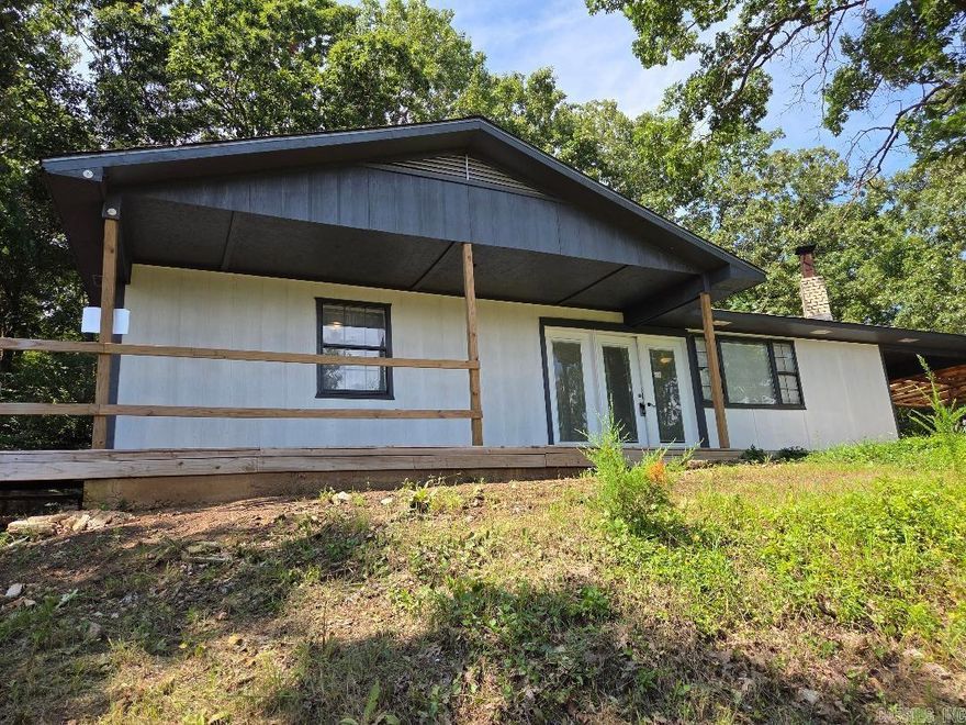 Welcome to this beautifully renovated 2 bedroom, 1 bath home sitting on a full acre m/l just outside the heart of Yellville. Perched on a peaceful hillside, you'll enjoy stunning views of town right from your back deck-the perfect spot for mourning coffee or evening sunsets. Step inside to find a fresh and stylish kitchen featuring beautiful countertops and plenty of space for meal prep and entertaining. The spacious living room offers cozy comfort with a wood insert fireplace, making it a warm and inviting place to relax year-round. Outside, you've got room to roam-a full acre m/l with no restrictions, perfect for a garden or even a few chickens! Enjoy the best of both worlds: peaceful country living just minutes from town.