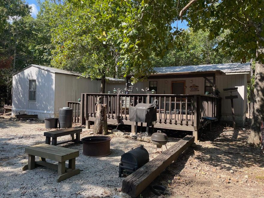 40 acres of prime hunting land located in Fulton County Arkansas. The perimeter is fully fenced and a 4 wheel drive is needed to access the land. The cabin will sleep 10-12 and is set up with a septic, a private well house, and propane heat. Located about 5 miles from Mammoth Springs, 10 miles from Hardy, and close to the Mini Islands turn off. Call for a private showing to see this secluded hunting land featuring deer and turkey.